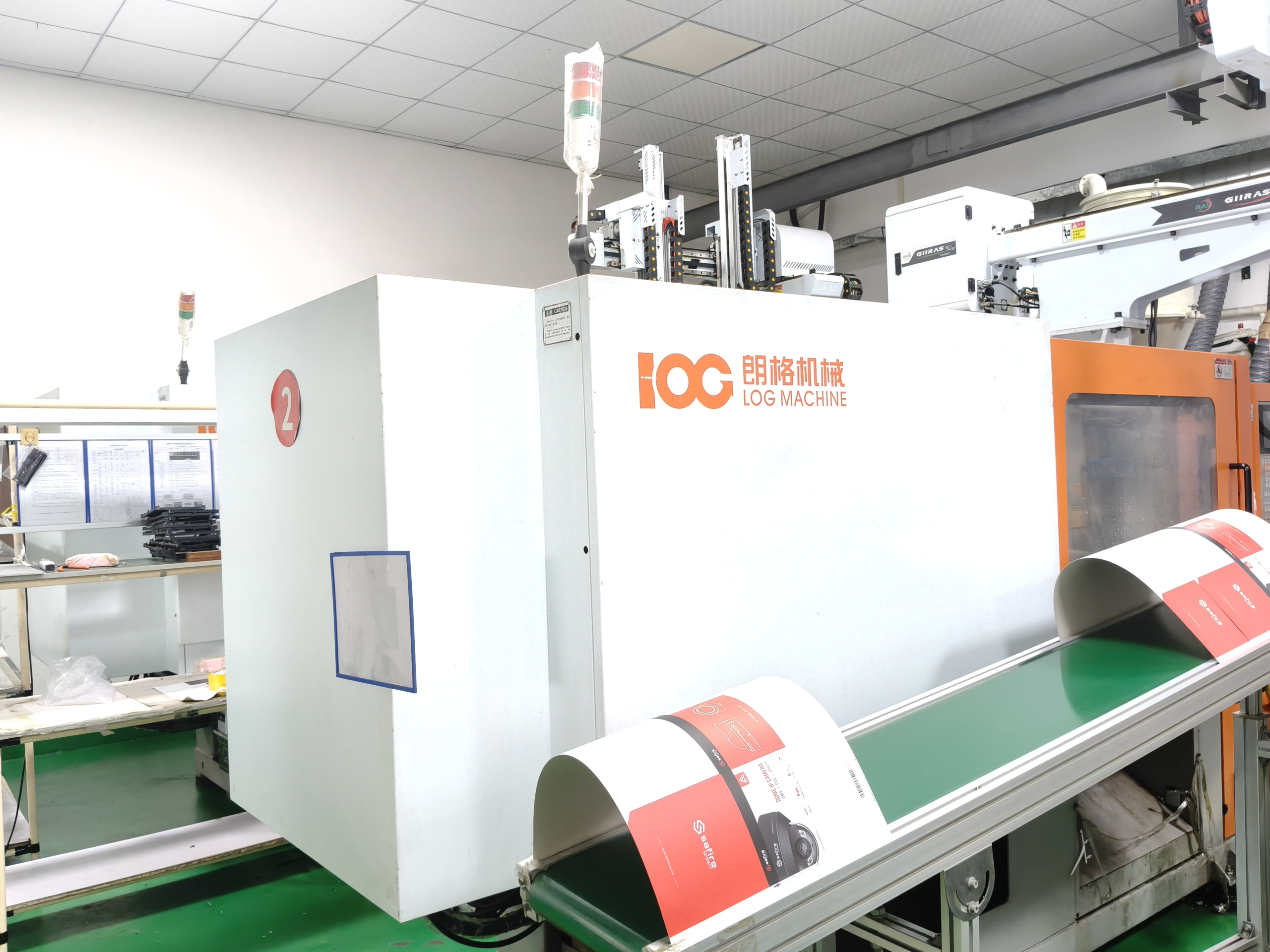 Injection molding workshop area with advanced manufacturing equipment